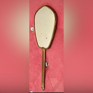 Vintage Art Deco Vanity Hand Held Mirror Floral Back with brass Accent handle